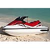 Jet ski on beach sand near sea