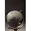 Crystal glass globe on gradient gray background