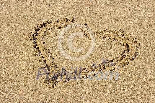 Heart drawn on beach sand Heart drawn on beach sand