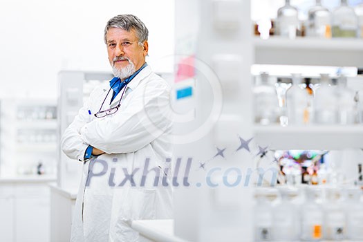 Senior male researcher carrying out scientific research in a lab (shallow DOF; color toned image) Senior male researcher carrying out scientific research in a lab (shallow DOF; color toned image)