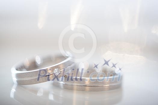 Two splendid wedding rings on a wedding day. Love concept. Two splendid wedding rings on a wedding day. Love concept.