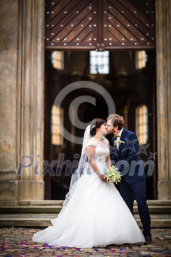 Portrait of a young wedding couple on their wedding day Portrait of a young wedding couple on their wedding day