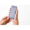 Female hand holding a smart phone, isolated on white