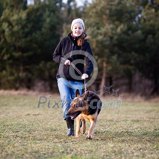 Master and her disobedient (German shepherd) dog Master and her disobedient (German shepherd) dog