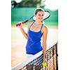 Portrait of a pretty young tennis player