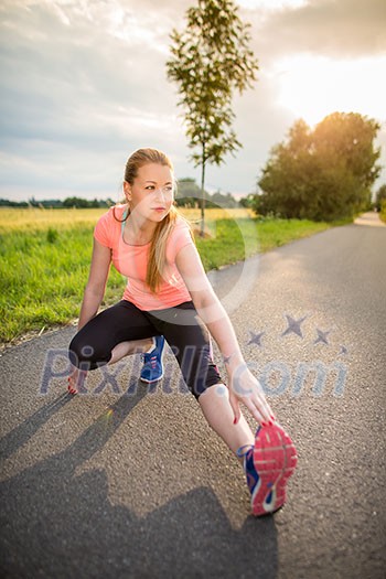Young woman running outdoors on a lovely sunny winter/fall day Young woman running outdoors on a lovely sunny winter/fall day