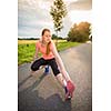Young woman running outdoors on a lovely sunny winter/fall day