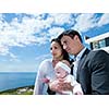happy young family couple with beautiful new born baby have fun at modern  home