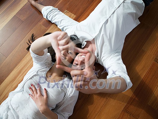 romantic happy young couple relax at modern home indoors romantic happy young couple relax at modern home indoors