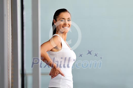 young woman practicing fitness and working out in a gym young woman practicing fitness and working out in a gym