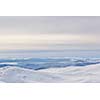 winter mountain landscape at sunny day and snow peaks