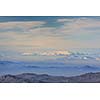 winter mountain landscape at sunny day and snow peaks