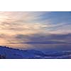 winter mountain landscape at sunny day and snow peaks