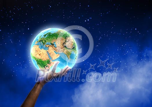 Close up of human hand holding Earth planet. Elements of this image are furnished by NASA Close up of human hand holding Earth planet. Elements of this image are furnished by NASA