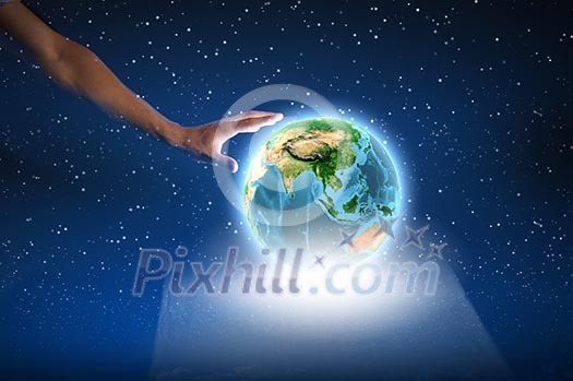 Close up of human hand holding Earth planet. Elements of this image are furnished by NASA Close up of human hand holding Earth planet. Elements of this image are furnished by NASA