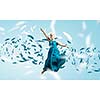 Young attractive woman in blue dress jumping high