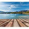 Wooden planks European nature background with lake in Alps, Germany