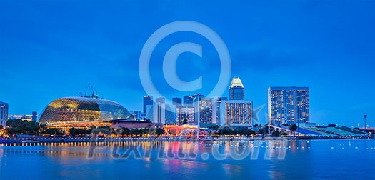 Singapore skyline panorama at Marina Bay in the evening Singapore skyline panorama at Marina Bay in the evening