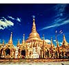 Vintage retro effect filtered hipster style image of Myanmer famous sacred place and tourist attraction landmark - Shwedagon Paya pagoda. Yangon, Myanmar