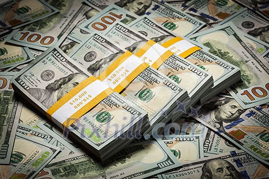 Creative business finance making money concept - background of new 100 US dollars 2013 edition banknotes bills bundles close up Creative business finance making money concept - background of new 100 US dollars 2013 edition banknotes bills bundles close up