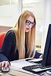 business woman working on computer at modern office