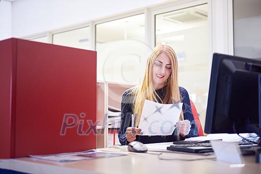 business woman working on computer at modern office business woman working on computer at modern office
