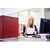 business woman working on computer at modern office