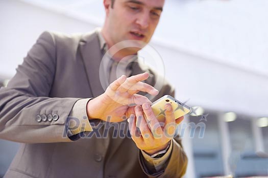 close up photo of business man work on phone at office close up photo of business man work on phone at office