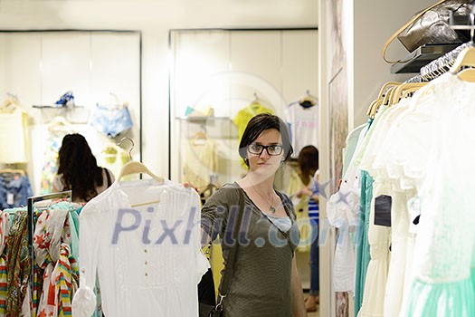 young woman in fashion store buy and shopping clothing young woman in fashion store buy and shopping clothing
