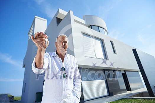 senior man in front of luxury modern home villa senior man in front of luxury modern home villa
