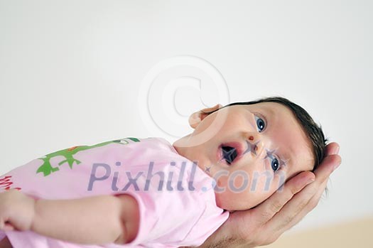 indoor portrait with happy young famil and cute little babby indoor portrait with happy young famil and cute little babby