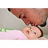 indoor portrait with happy young famil and  cute little babby 