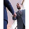 business partners, partnership concept with two businessman handshake