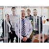 Double exposure design. Senior businessman with his team at office. business people group