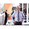 senior businessman with his team at office. business people group