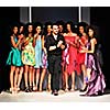 young successful fashion designer on the end of fashion show