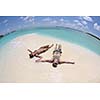 happy young romantic couple in love have fun and relaxing on beautiful beach