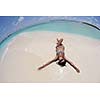 beautiful and happy young woman on beach have fun and relax on summer vacation  over the crystal clear sea