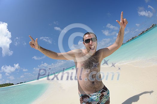 beautiful and happy young woman on beach have fun and relax on summer vacation over the crystal clear sea beautiful and happy young woman on beach have fun and relax on summer vacation over the crystal clear sea