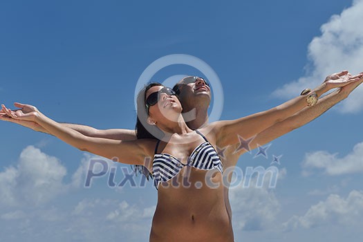 happy young romantic couple in love have fun and relaxing on beautiful beach happy young romantic couple in love have fun and relaxing on beautiful beach