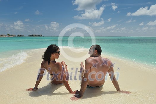 happy young romantic couple in love have fun and relaxing on beautiful beach happy young romantic couple in love have fun and relaxing on beautiful beach