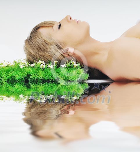 beautiful blonde woman face isolated on white with small green peace of grass beautiful blonde woman face isolated on white with small green peace of grass