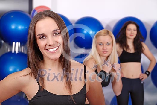 pretty girls working out in a fitness club pretty girls working out in a fitness club
