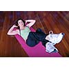 young pretty woman exercising in a fitness center