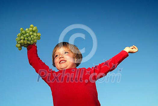 girl with grape outdoor girl with grape outdoor