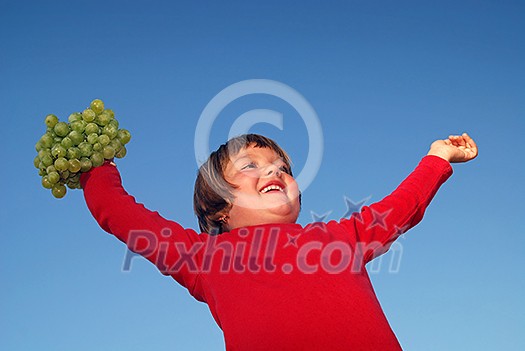 girl with grape outdoor girl with grape outdoor
