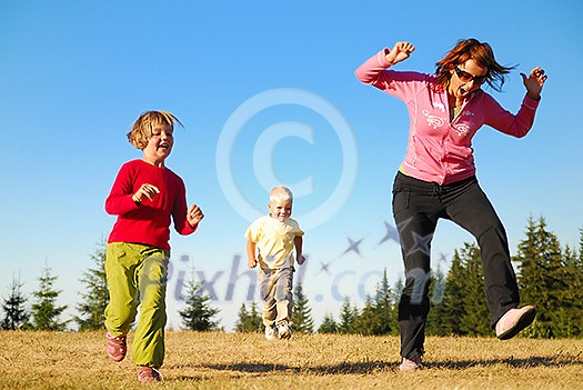mother and kids having fun outside mother and kids having fun outside