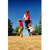mother and kids having fun outside