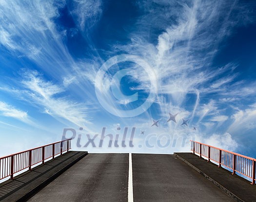 Asphalt road going into sky with clouds Asphalt road going into sky with clouds