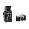 Old rangefinder and  twin-lens reflex large format film cameras isolated on white background